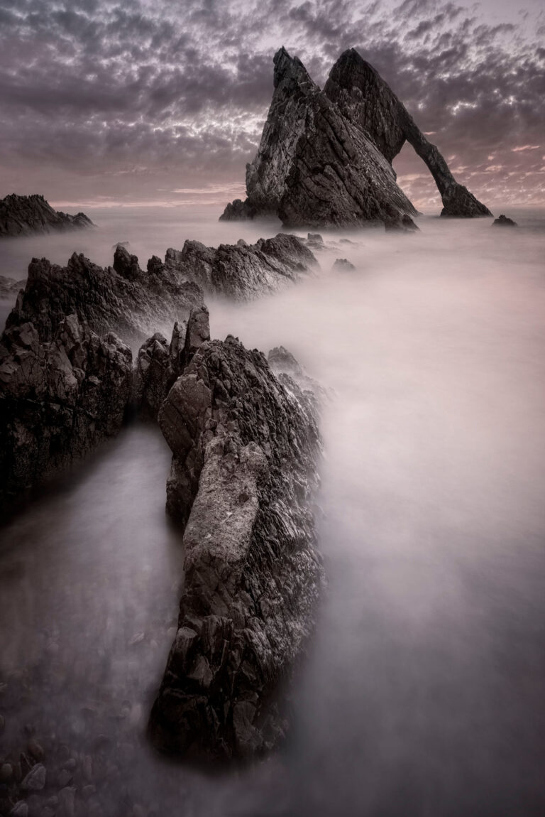Photo of Bow Fiddle Rock in Scotland. Buy a fine art print.