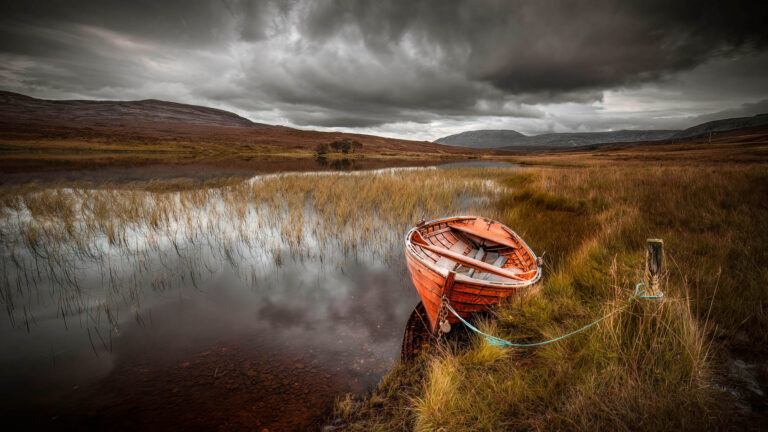 Boat moored at Loch Awe in Assynt, Scotland.